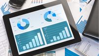 ipad with graphs stock image